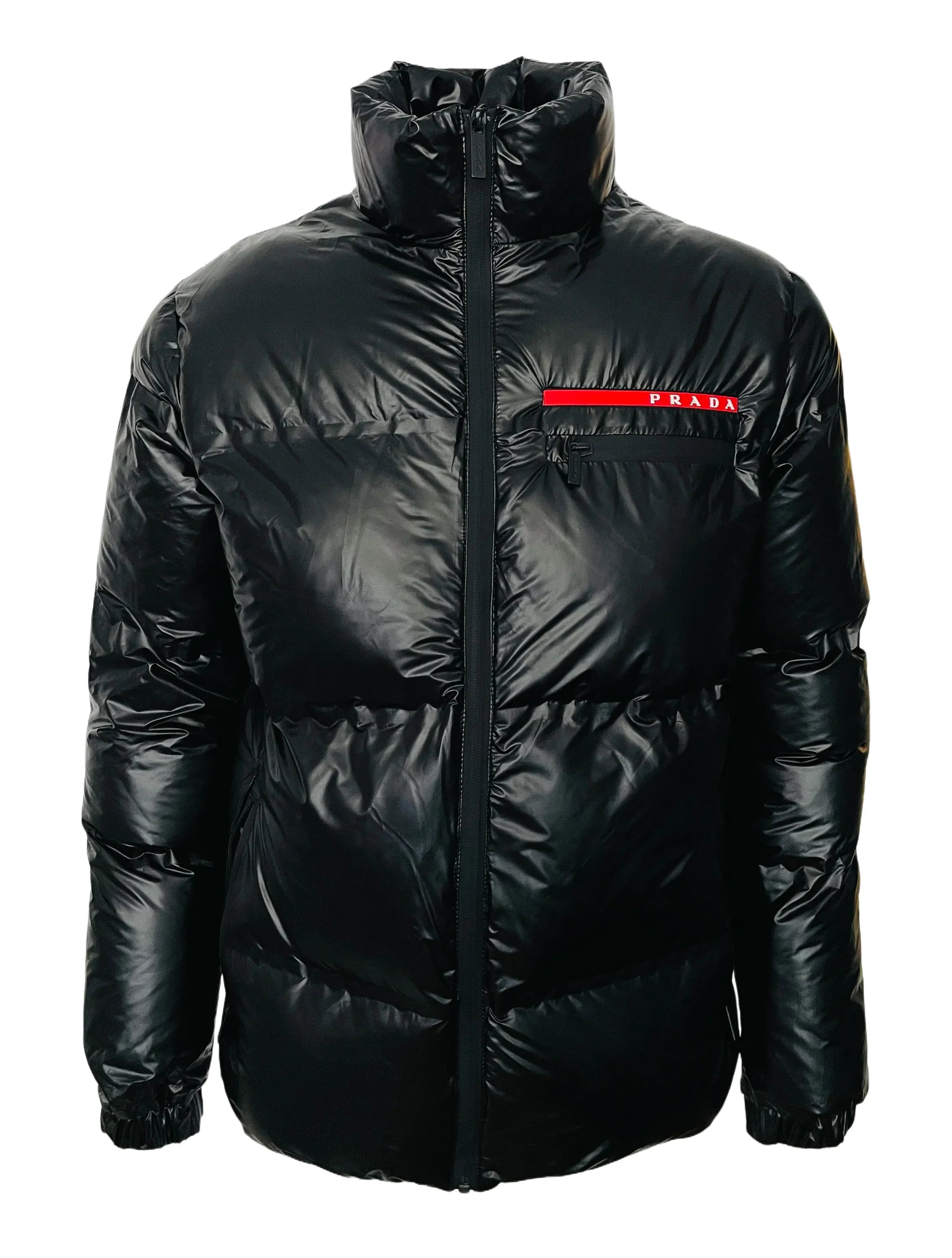 Black Prada puffer jacket with high collar and red logo strip on chest pocket